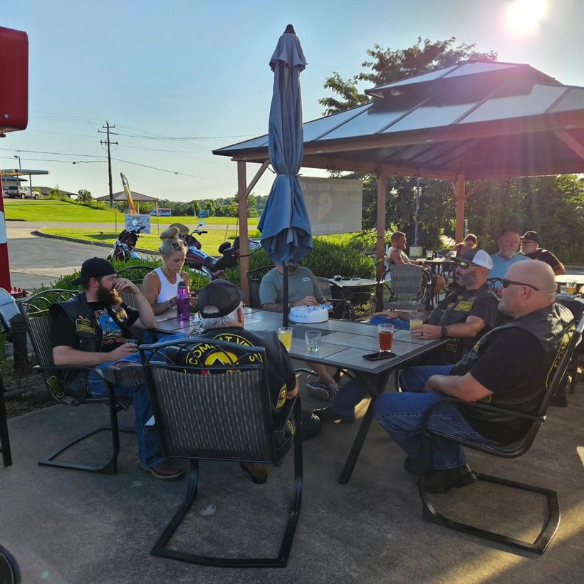 A full patio on a lake afternoon &mdash; Demolition Brewing Company, Laurie, Missouri